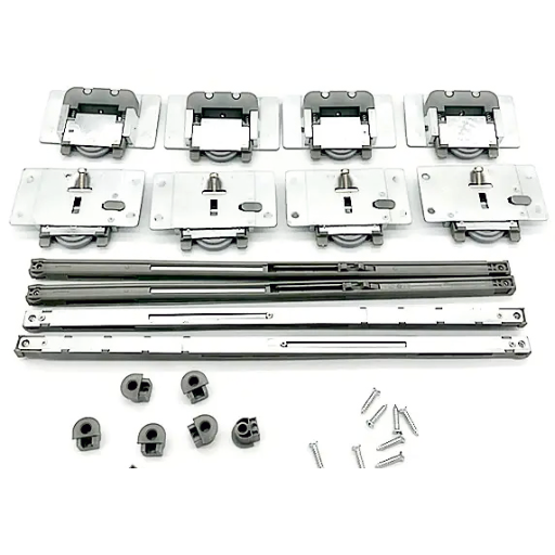 Kitchen pull-out drawer with chrome basket holding black bottles, white cabinetry, and gray floor